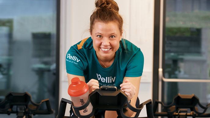 Velliv Sundhed, Medarbejder deltager i spinning, fitnessrum